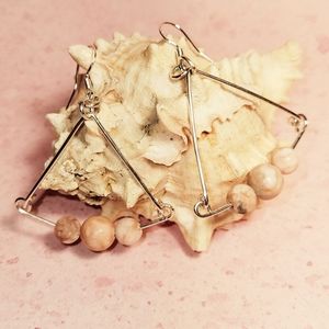 Handcrafted Sterling Silver Pink Zebra Jasper dangle earrings.